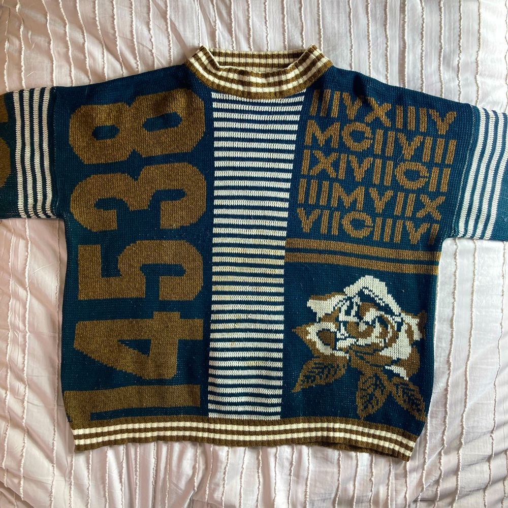 Colorful vintage Forelli sweater with Roman numerals. Flower print and stripes.